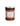 A jar of Perche ci Credo Eggplant Caponata, showing a dark colored spread with visible pieces of eggplant and raisins.