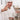 Chef tasting tomatoes from a ladle in a kitchen setting