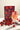 La Vie en Rose iced tea package with a glass of iced tea and cherries on a white surface