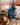 Bottle of Bellini Zero Ciprian on a festive table with a small Christmas tree and cake.