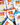 San Carlo potato chip packages with various flavors on a colorful background