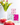 Tea cups with floral tea boxes and tulips on a light background