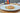 Orzo pasta dish with package of pasta in the background