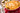 Macaroni and cheese in a red dish