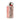 A ceramic bottle of extra virgin olive oil with red striped patterns and a hand-painted design