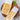 Two packages of ZIa Pia pasta on a wooden board with a white background