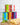 Five colorful cans of Italianvera tomatoes on a wooden board with a white tiled wall background
