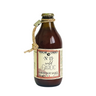 A glass bottle of Perche Ci Credo tomato sauce with wild garlic