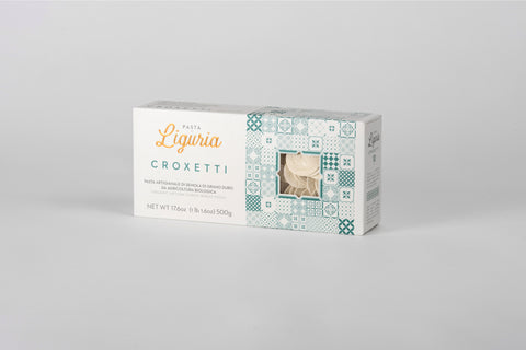 Box of Pasta di Liguria organic Croxetti on a light gray background