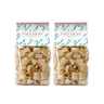 Two packages of Zia Pia paccheri pasta on a white background
