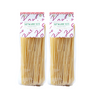 Two packages of Zia PIa organic spaghetti with a white background