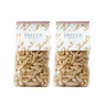 Two packages of Zia Pia trecce pasta on a white background