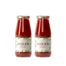 Two bottles of Zia Pia sauce with a white background
