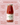 Zia Pia jar of tomato sauce with product details on a pink background 