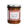 A jar of Perche ci Credo Eggplant Caponata, showing a dark colored spread with visible pieces of eggplant and raisins.