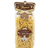 Packaged Cavatappi IGP pasta in a clear plastic bag with branding and product information displayed on a label on a white background