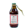 A bottle of Madre homemade tomato sauce with a label indicating it's a product from Perche Ci Credo