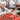 Perche ci Credo worker sorting tomatoes