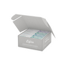 An open gift box labeled 'Pasta di Liguria' revealing various shapes of organic pasta inside.