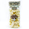 Packaged Paccheri IGP pasta in a clear plastic bag with branding and product information displayed on a label on a white background