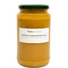 A glass jar of organic yellow cherry tomato puree with a green lid and a label that reads 'PASSATA DI POMODORO GIALLO'.