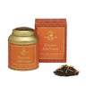 A packaged loose tea product from La Via del Tè, with a gold and orange label, a red and gold box, and a small pile of dried tea leaves in front.