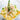 Orzo pasta dish with squid and parsley on a white background