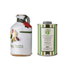White ceramic bottle with decorative elements and a green and white canister on a white background