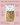 Zia Pia organic gigli with text highlighting product details on a pink background
