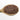Wooden spoon filled with whole grain red rice on a white background