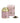 A La Via del Té branded tea tin labeled 'Kate' with a pink background and green leaves, accompanied by a pink box, alongside a scattered pile of green tea leaves.