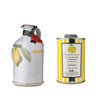 White ceramic lemon olive oil bottle next to a can of Galantino lemon olive oil on a white background