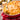 Macaroni and cheese in a red dish