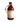 A glass bottle of Perche Ci Credo Sun-dried Tomato Sauce with a label