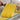 Person cutting strands of fresh made tagliatelle pasta