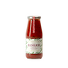 A glass jar of Zia Pia basilico tomato sauce with a white label with red text.