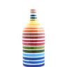 A multicolored striped ceramic bottle filled with extra virgin olive oil.
